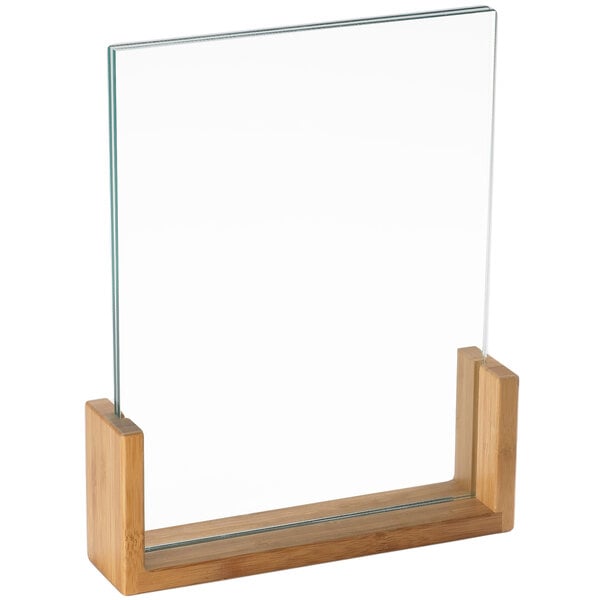 A clear acrylic panel held upright by a rectangular bamboo base.