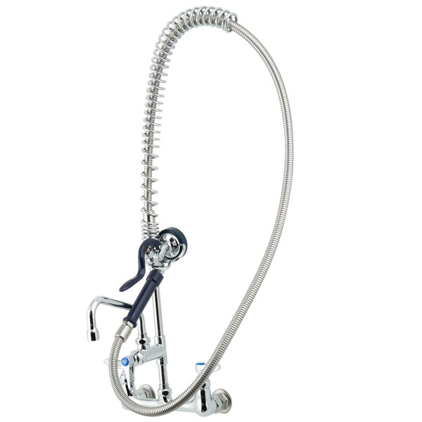 A chrome T&S pet grooming faucet with a hose.