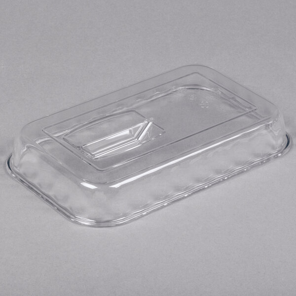A clear, rectangular plastic lid with a raised handle in the center, shown on a plain background.