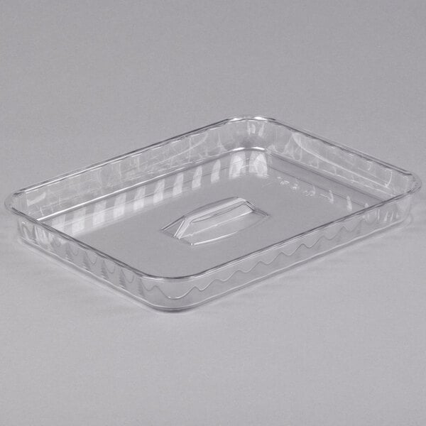 A clear, rectangular plastic lid with a raised handle in the center, designed to fit a matching container.
