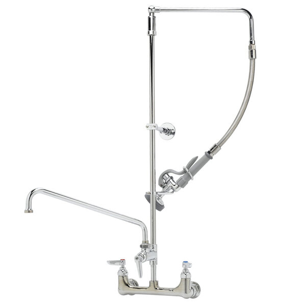 A T&S chrome wall mount pet grooming faucet with a coiled hose and aluminum sprayer.