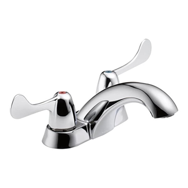 A chrome-finished faucet with two wide lever handles and a curved spout, mounted on a rectangular base.