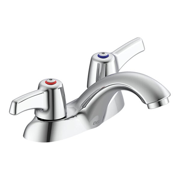 A chrome-finished faucet with two lever handles, one marked with a red dot and the other with a blue dot, mounted on a single base.