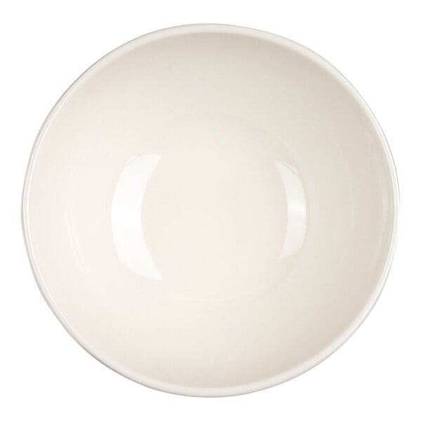A round, plain ivory-colored bowl viewed from above.