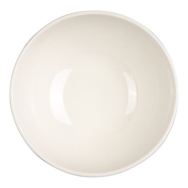 A round, plain ivory-colored bowl viewed from above.