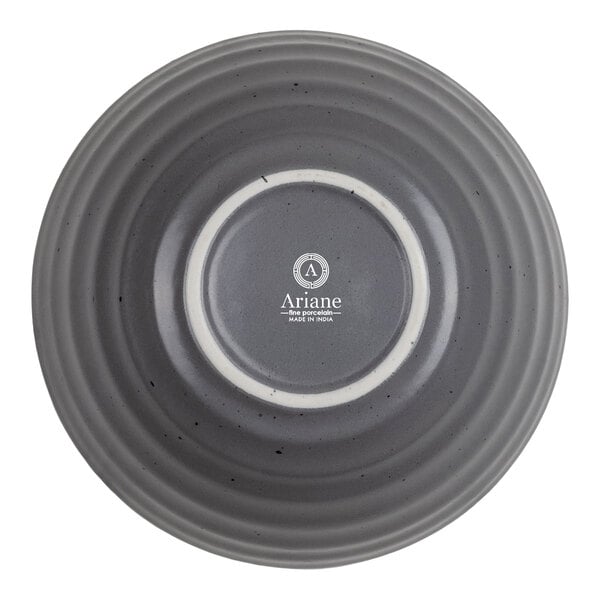 A round, gray, ribbed bowl shown from the bottom with a central white ring and the brand name 'Ariane' printed in the center.