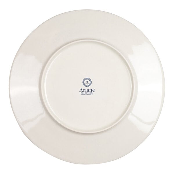 A round ivory porcelain plate shown from the bottom with a logo and text at the center.