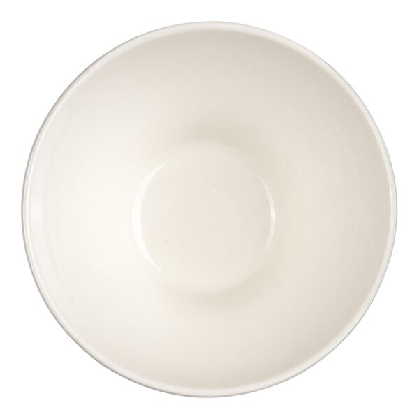 A round, plain ivory-colored bowl viewed from above.