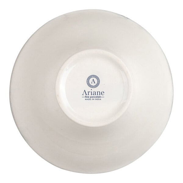 The image shows the underside of a white porcelain bowl with the brand name 'Ariane' and 'Made in India' printed on the base.