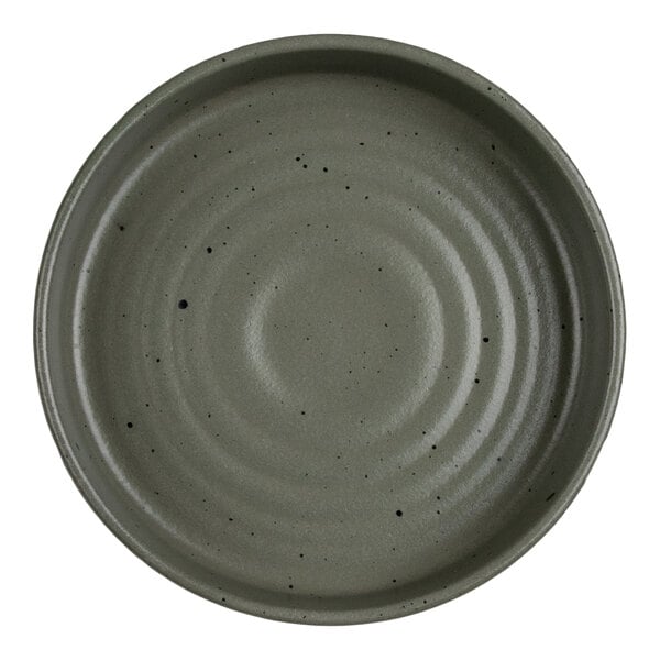 A round, green bowl with a matte finish and subtle black speckles, viewed from above.