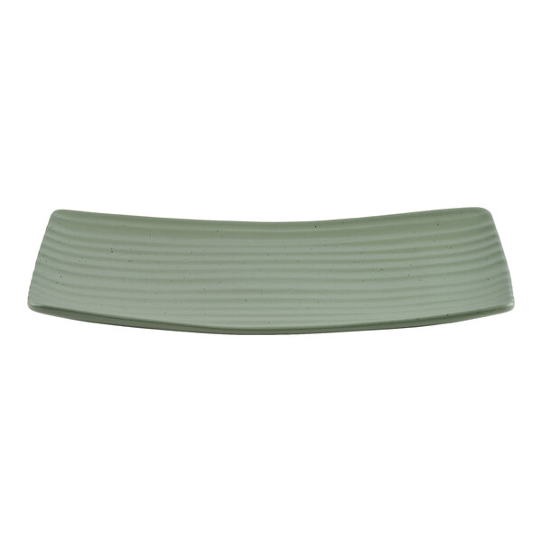 A rectangular, green platter with a ribbed texture and slightly curved edges.