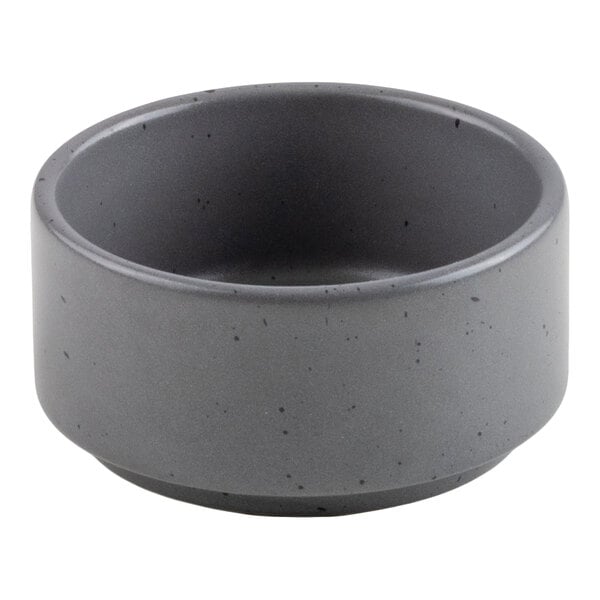 A small, round, gray bowl with a smooth matte finish and subtle speckled pattern.