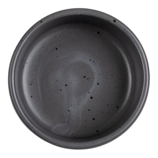 A round, gray dish with a speckled pattern and a smooth, slightly glossy finish.