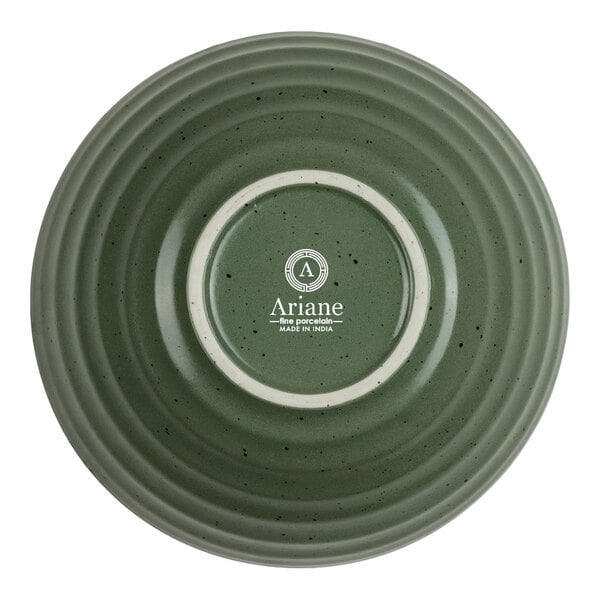 A green, round porcelain bowl shown upside down with concentric ridges and a logo that reads 'Ariane fine porcelain MADE IN INDIA' on the base.