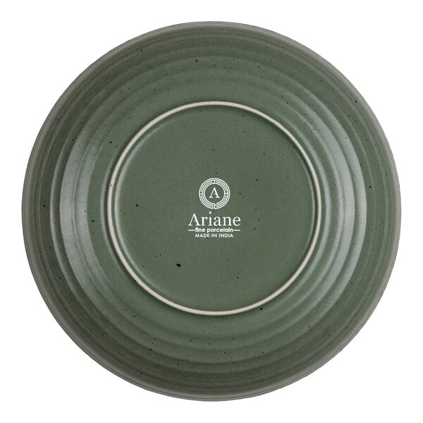 The image shows the underside of a round, green, ribbed porcelain bowl with the brand name 'Ariane' and product details printed in white at the center.