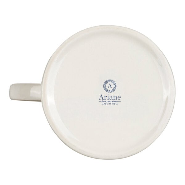 A white porcelain cup is shown upside down, displaying the brand name and logo on its base.
