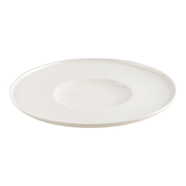 A round, flat, white plate with a slightly raised rim and a shallow central indentation.