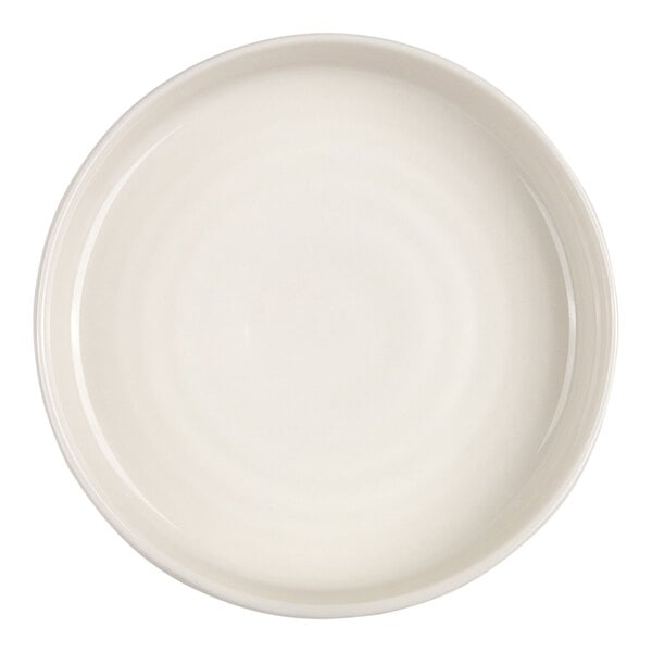 A round, ivory-colored bowl with a smooth, glossy finish viewed from above.
