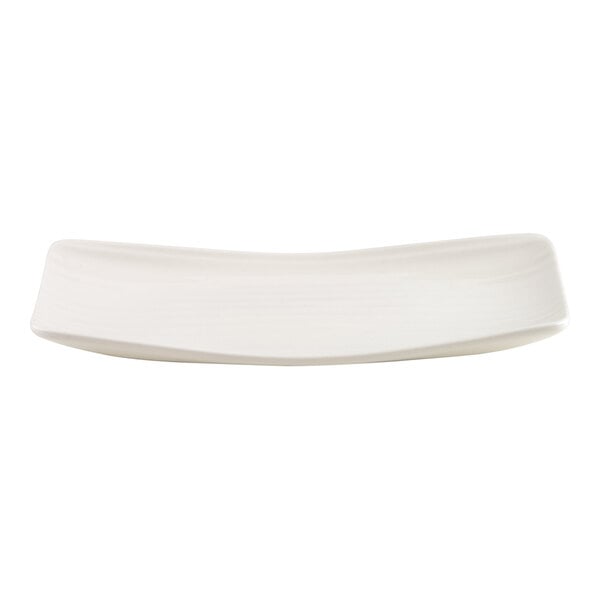 A rectangular, slightly curved, ivory-colored platter with smooth edges.