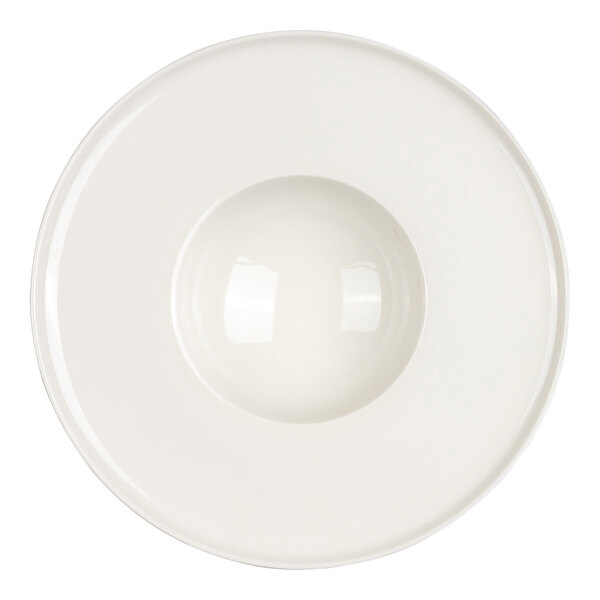 A round, white plate with a wide rim and a deep, bowl-like center.