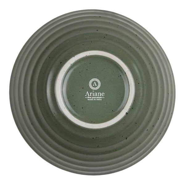 A round, shallow, ivory-colored bowl with smooth, glossy finish.