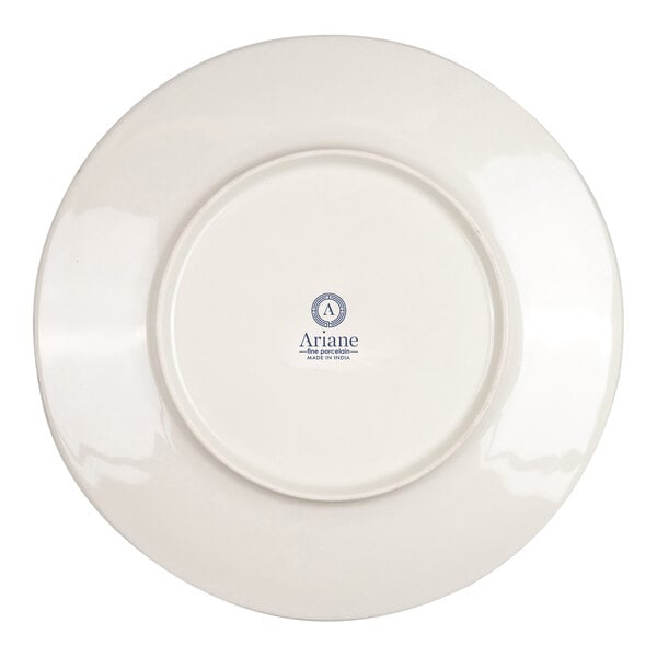 The image shows the underside of a round, ivory-colored porcelain plate with a logo and text printed in the center.