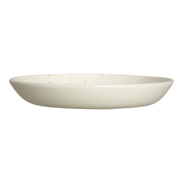 A shallow, round, off-white plate with a slightly raised rim and subtle speckled pattern.