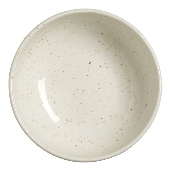 A round, white bowl with a subtle speckled pattern viewed from above.