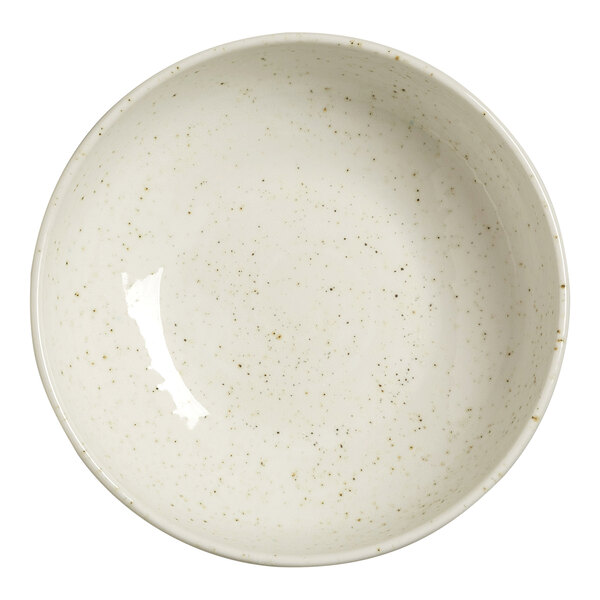 A round, shallow, off-white bowl with a speckled pattern and a glossy finish.