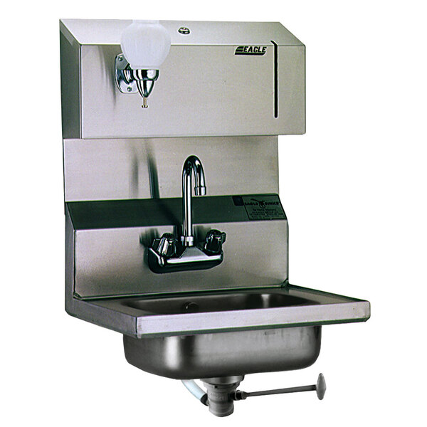 A stainless steel Eagle Group hand sink with a gooseneck faucet, towel dispenser, and soap dispenser.