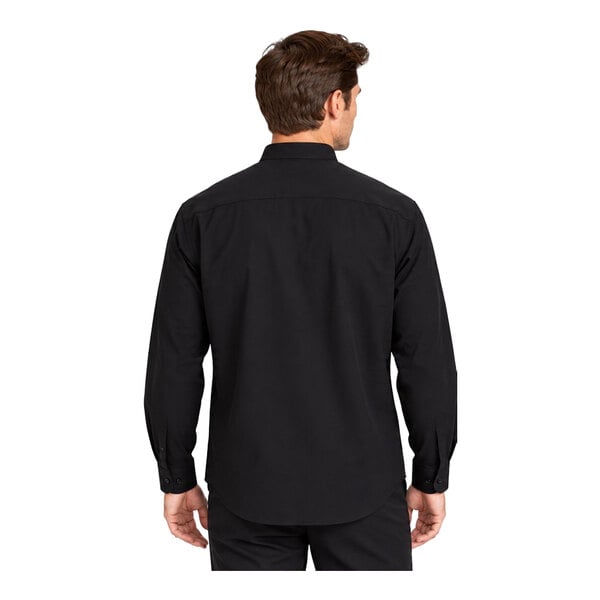 A man is shown from the back wearing a long-sleeve black dress shirt with a banded collar.