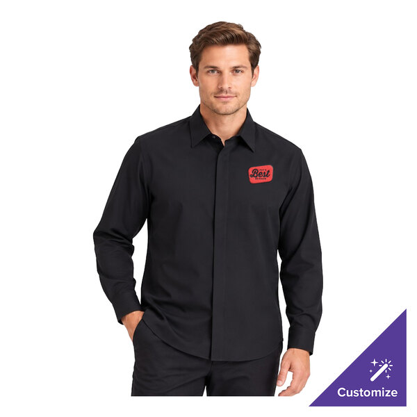 A man is wearing a black long sleeve dress shirt with a red embroidered patch on the left chest and a cafe collar.