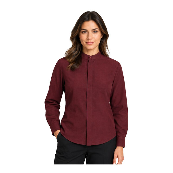 A woman is wearing a long-sleeve, burgundy shirt with a banded collar and black pants.
