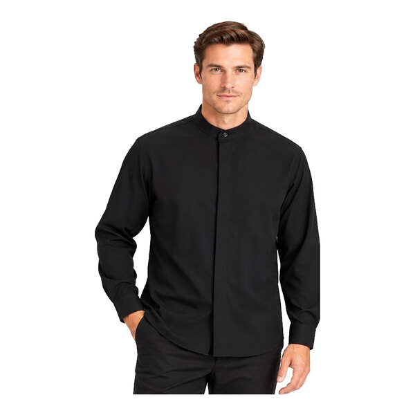 A man is wearing a black long-sleeve dress shirt with a banded collar and hidden buttons.