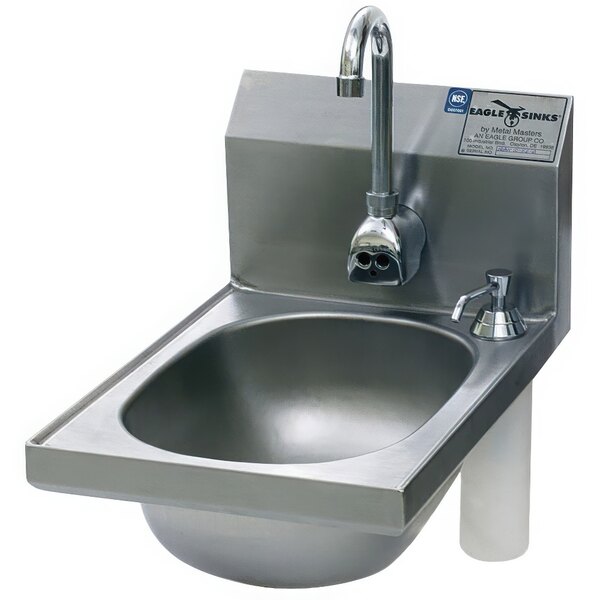 An Eagle Group stainless steel hand sink with a faucet and soap dispenser.