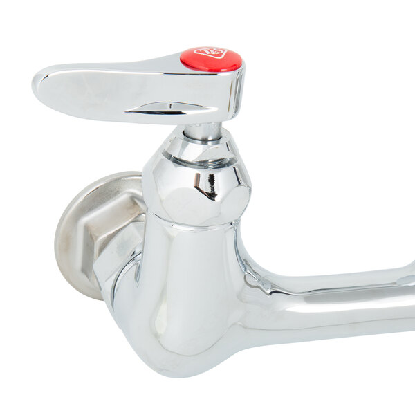 A T&S chrome wall mount pet grooming faucet with a red handle and button.
