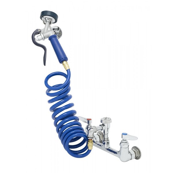 A blue coiled hose attached to a white faucet.