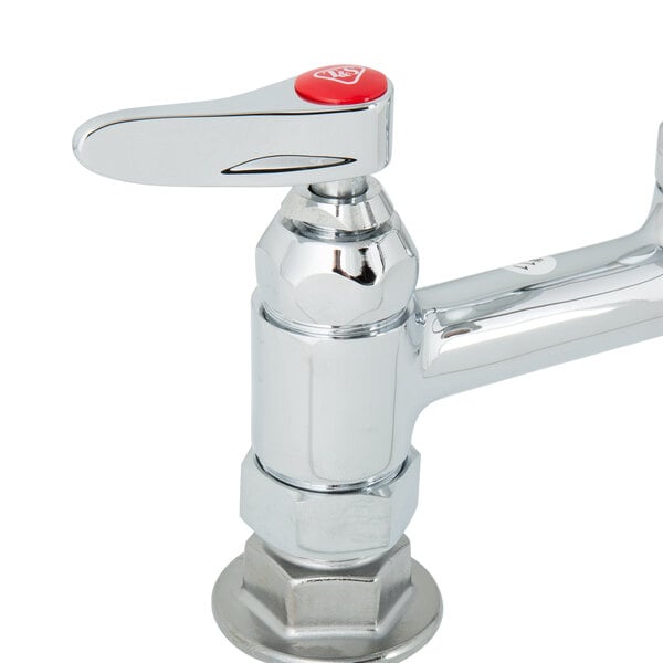 A chrome T&S pet grooming faucet with red buttons.