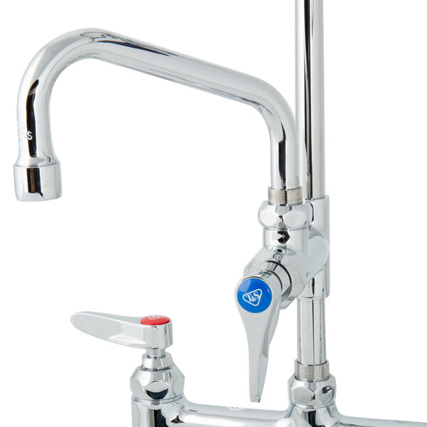 A chrome deck mount pet grooming faucet with blue and red handles.