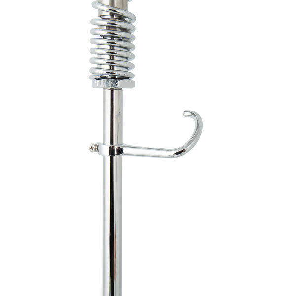 A silver metal T&S deck mount pet grooming faucet with metal handles and a spring.