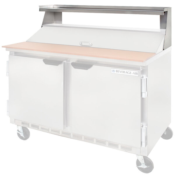 A Beverage-Air stainless steel overshelf on a white Beverage-Air refrigerator.