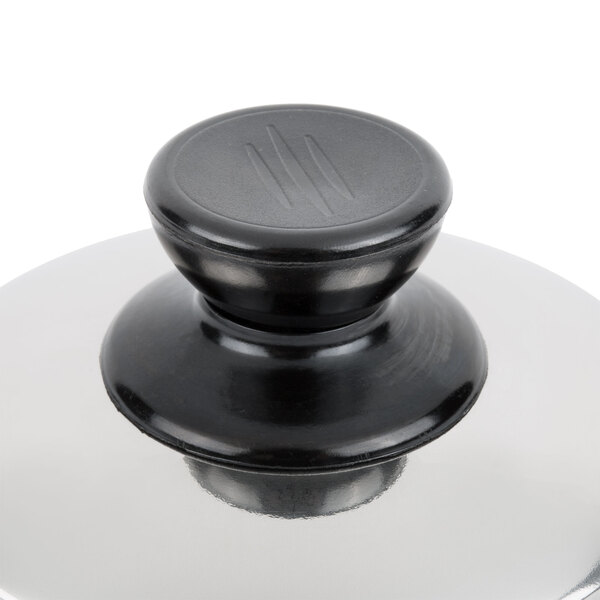 A black Town stainless steel dim sum steamer cover with a silver knob.