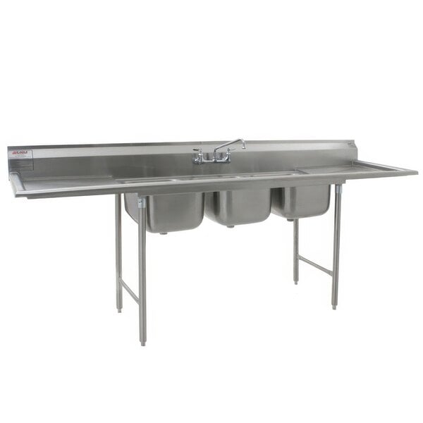 A stainless steel Eagle Group 3 compartment sink with two drainboards.