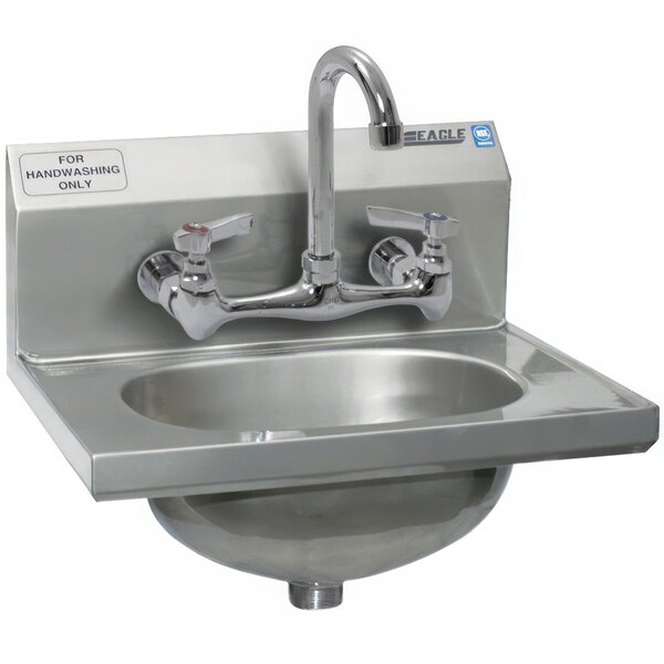 A close-up of a stainless steel Eagle Group MicroGard hand sink with two faucets.