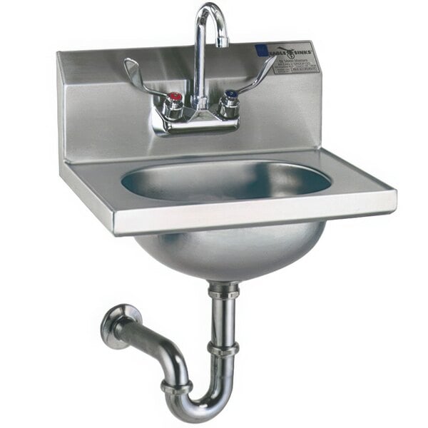 A close-up of a stainless steel Eagle Group hand sink with a gooseneck faucet and wrist action handles over a pipe.