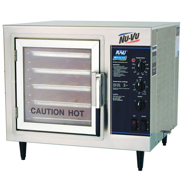 A NU-VU countertop convection oven in a school kitchen with a caution hot sign.