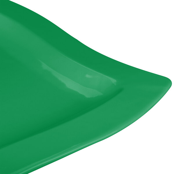A green cast aluminum rectangular platter with curved corners.