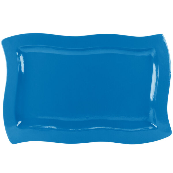 A sky blue rectangular platter with wavy edges.