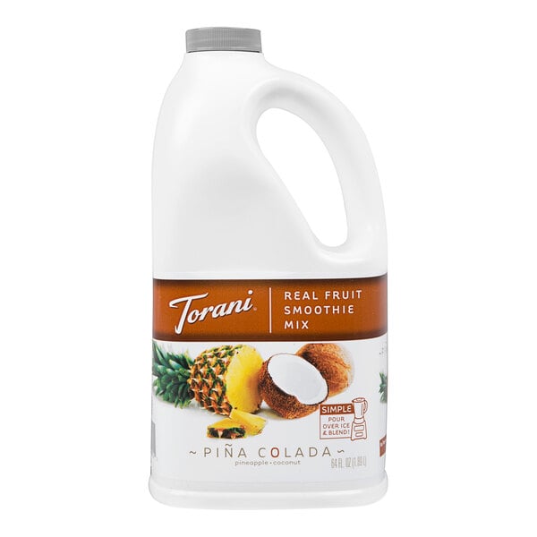 A white plastic jug of Torani Pina Colada Fruit Smoothie Mix with a white label.