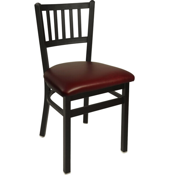 A BFM Seating black steel side chair with burgundy vinyl seat.